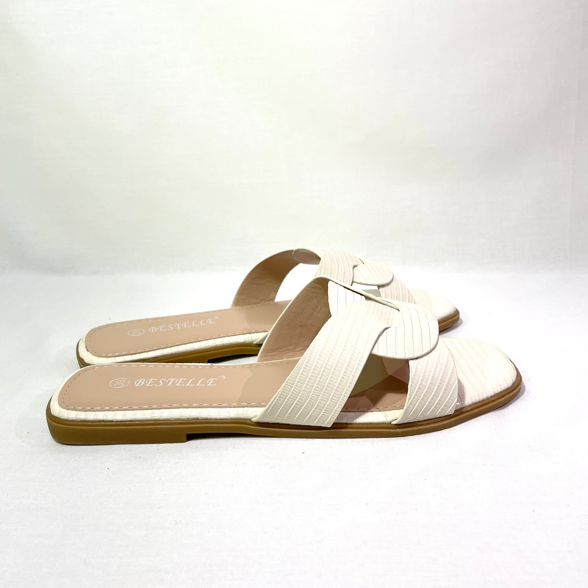 Mules beige à bande entrelacée